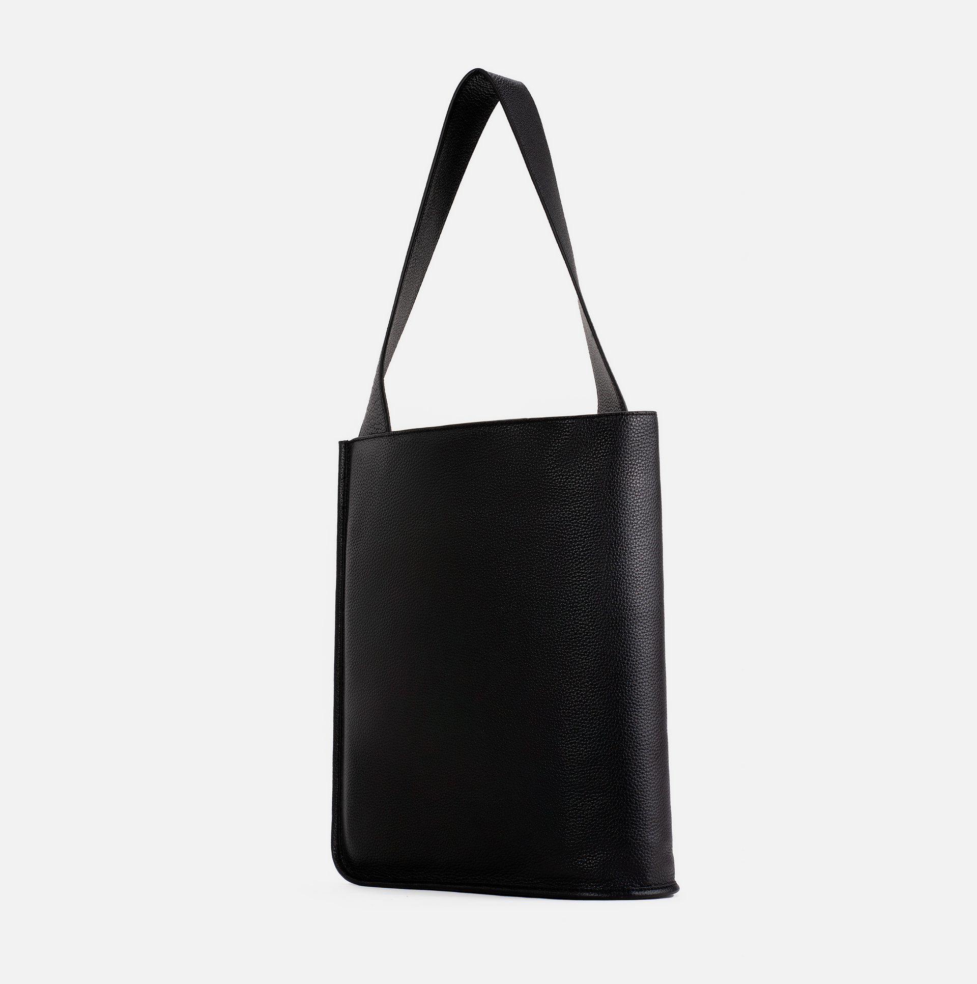 Eileen wraparound pebble leather shoulder bag in black