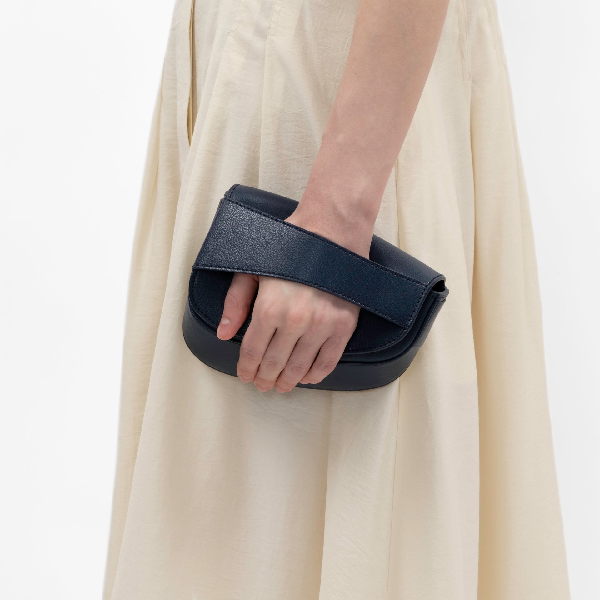 Ellipse Pebble Leather Fanny Pack in Navy