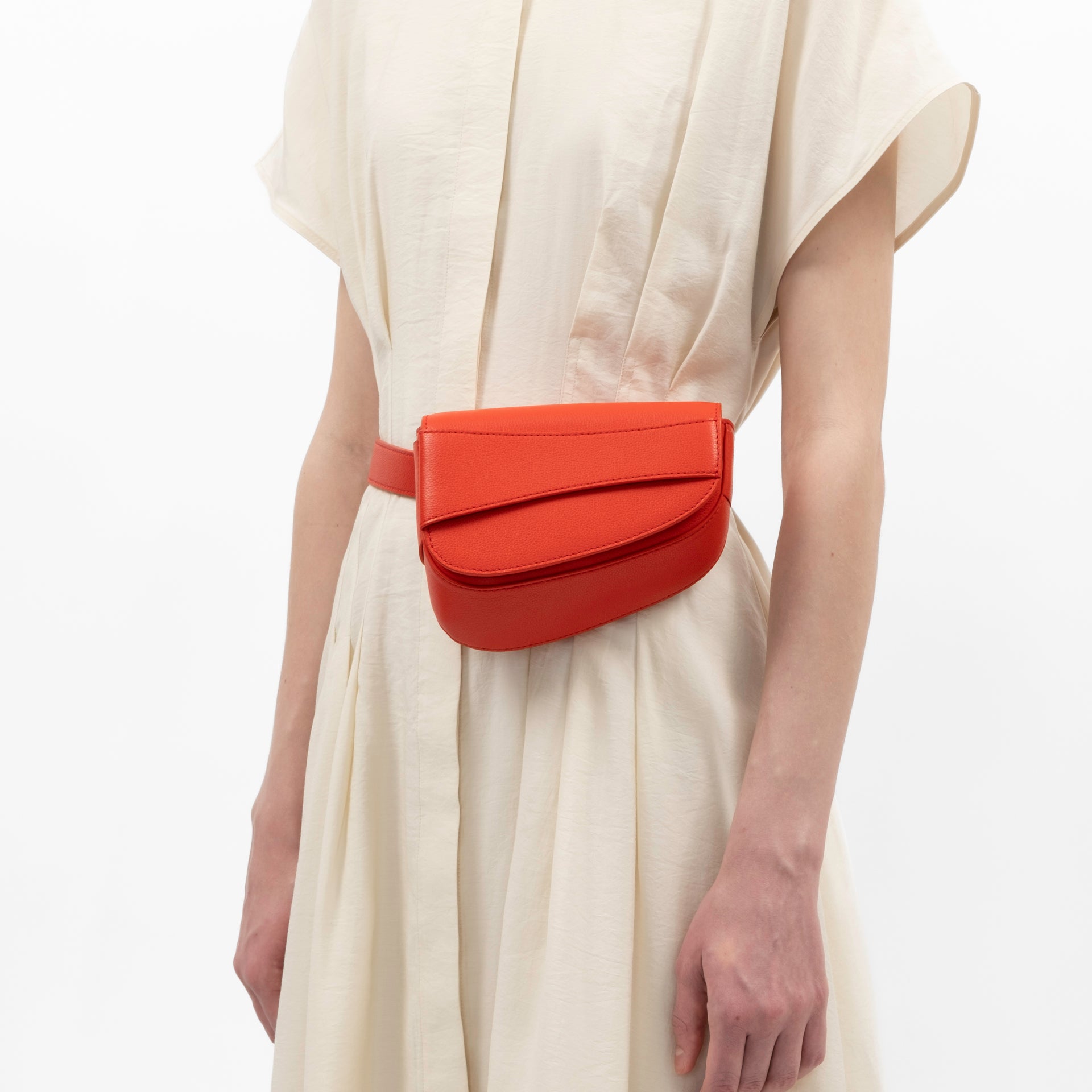 Ellipse Pebble Leather Fanny Pack in Tomato