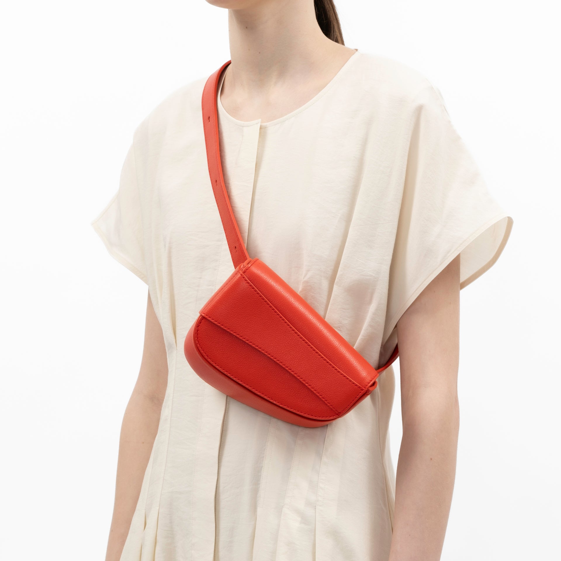 Ellipse Pebble Leather Fanny Pack in Tomato