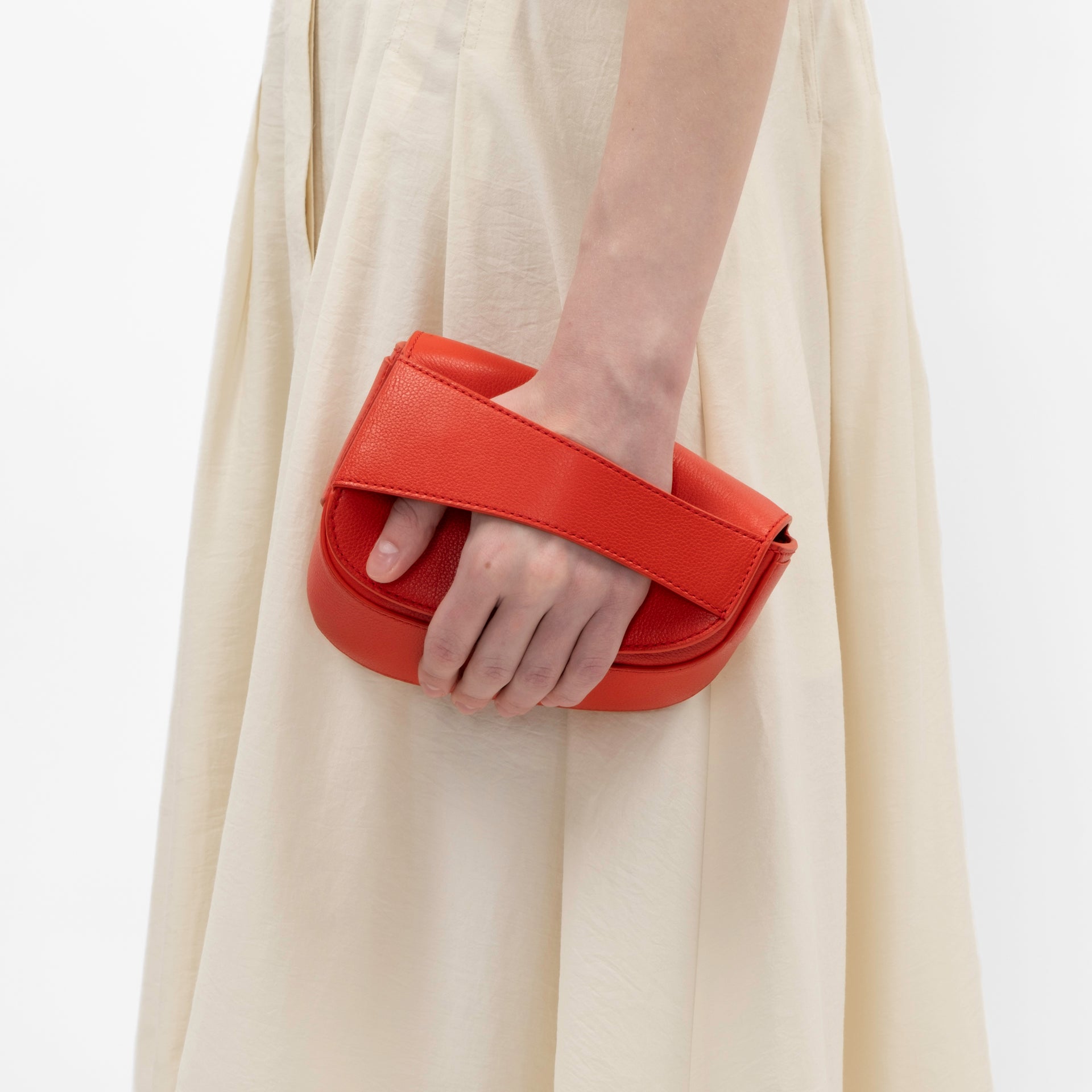 Ellipse Pebble Leather Fanny Pack in Tomato