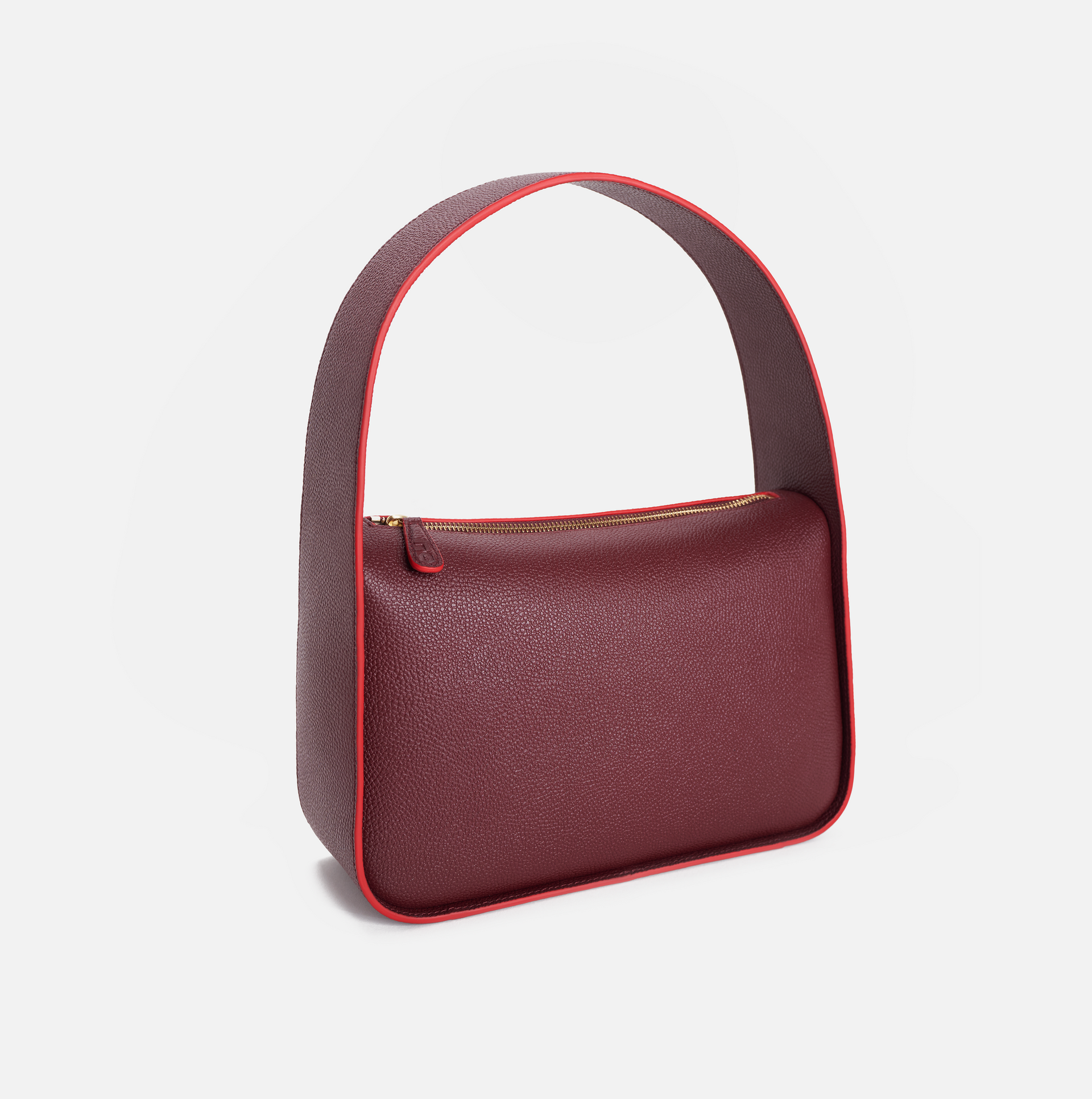 Grete pebble leather shoulder bag in carnelian with red edge paint