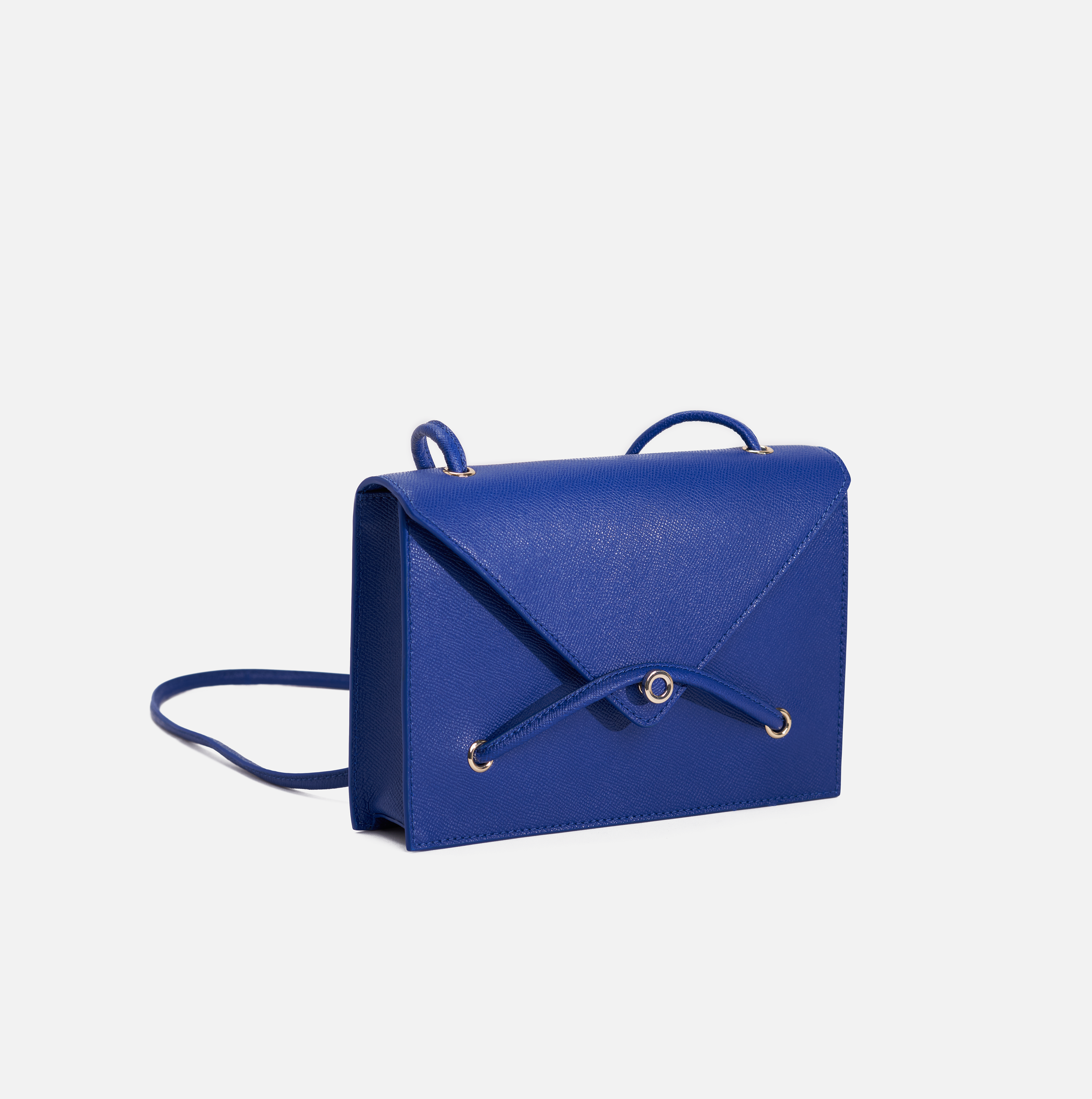 Lella cross grain embossed leather crossbody bag in cobalt