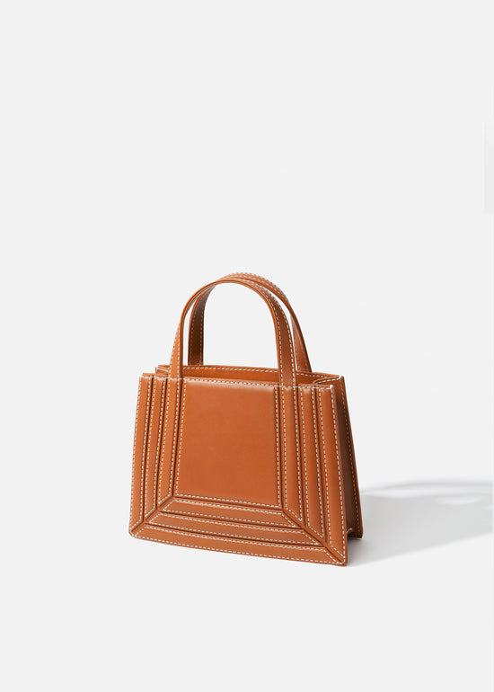 Palladian mini laramie leather double handle bag in cognac